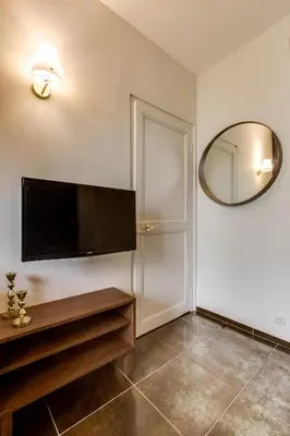 a bedroom with blue and white walls and a bed at CASA NISSARTE - Central near Train station - PARKING - confort & cosy- AC in Nice