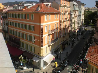 an overhead view of a city street with buildings at Hotel De Suède in Nice