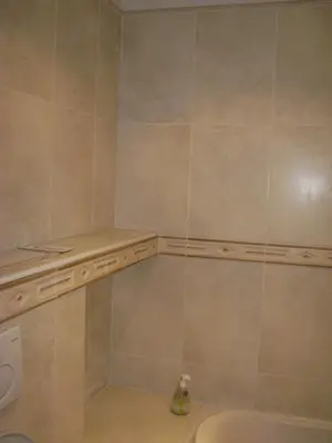 a bathroom with a tub and a sink at Appartamento Sole in Nice