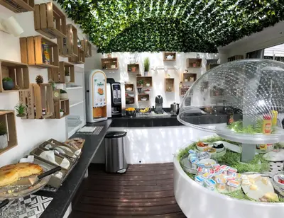 a bakery with a display of food on a counter at Boutique Hotel & Spa la Villa Cap Ferrat in Saint-Jean-Cap-Ferrat