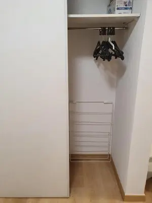 a room with a closet with a white wall at Oranger in Nice