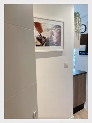 a picture hanging on a wall in a room at Maison de Côte - Felice in Nice