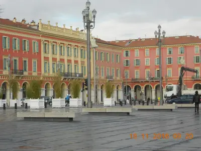 a large building with benches in front of it at Breakfast at Sophy's in Nice