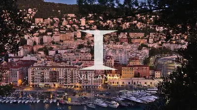 a view of a city with a large white statue at Penthouse Lou Lòu by iVillamia com in Nice