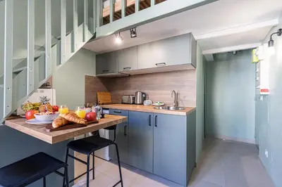 a kitchen with a table with food on it at MY CASA - SAINT SIAGRE 3 - Near Jean Medecin in Nice