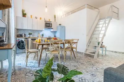 a kitchen and dining room with a table and chairs at MY CASA - FRICERO - Comfortable 5 people- 200m near the Sea in Nice