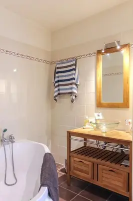 a bathroom with a tub and a sink at MY CASA - VEILLON - 2 bedrooms - City Center in Nice