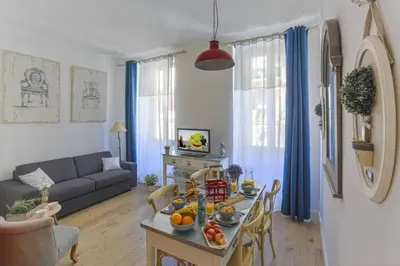 a living room with a table with fruit on it at MY CASA - CASSINI GT - 1 bedroom - Balcony - Place Garibaldi in Nice