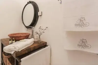 a bathroom with a mirror and a sink at MY CASA - CASSINI GT - 1 bedroom - Balcony - Place Garibaldi in Nice