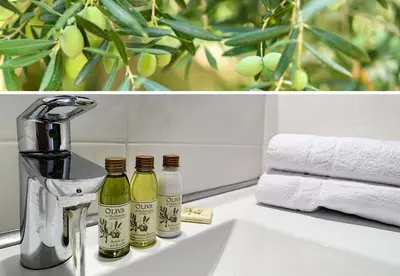 a bathroom sink with two bottles of wine on it at Nestor&Jeeves - GIBRALTAR TERRASSE - Central - By sea - Pedestrian zone in Nice