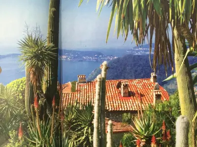 a painting of a house with a view of the ocean at Eze Monaco middle of old town of Eze Vieux Village Romantic Hideaway with spectacular sea view in Èze