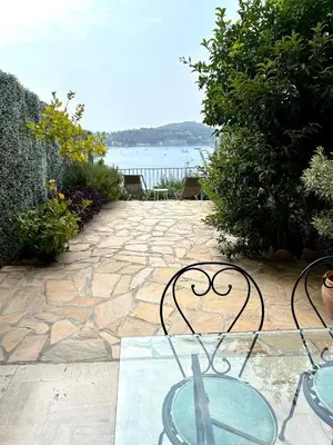 a glass table with a heart on top of it at Studio Leopolda in Villefranche-sur-Mer