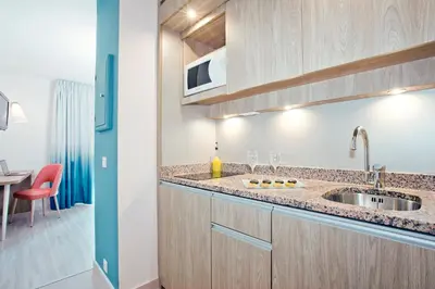 a kitchen with a sink and a counter top at Residhome Nice Promenade in Nice