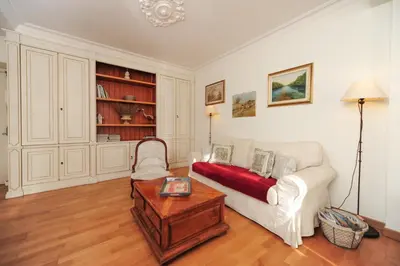 a living room with a couch and a coffee table at Appartement Clemenceau Centre Nice Five stars Holiday House in Nice