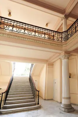 a staircase in an old building with a railing at Appartement Clemenceau Centre Nice Five stars Holiday House in Nice