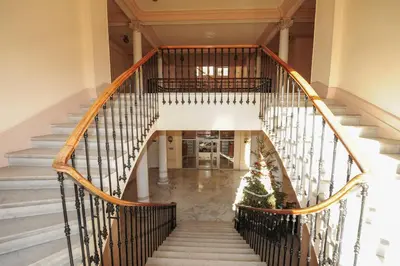 a staircase in a house with a christmas tree at Appartement Clemenceau Centre Nice Five stars Holiday House in Nice