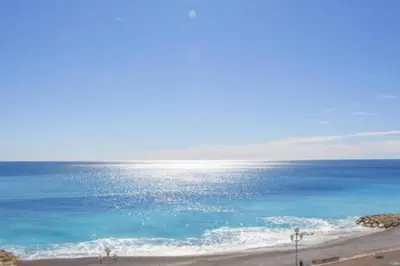 a view of the ocean from a beach at MY CASA - PROM 13 - Sea View - Promenade des Anglais - Terrace in Nice