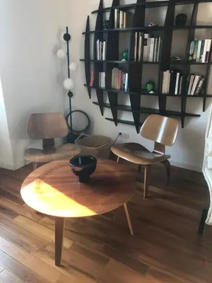 a living room with two chairs and a table at Villefranche Sur Mer One Bed in Villefranche-sur-Mer