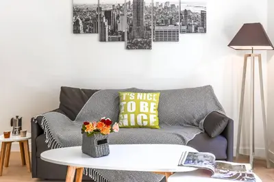 a living room with a couch and a table at MY CASA - 48 GIOFFREDO - NEAR PLACE MASSENA in Nice