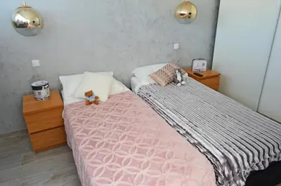 a bedroom with two beds with stuffed animals on them at Royal Lux NICE -Last floor, see view in Nice