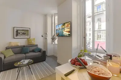 a living room with a couch and a table at MY CASA - PAULE - Great Old Town Studio w AC in Nice