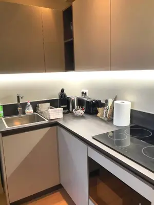 a kitchen with a sink and a counter top at Dreamplace in Nice