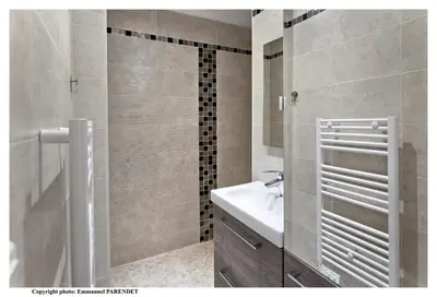 a bathroom with a sink and a shower at Parc Anahit in Nice