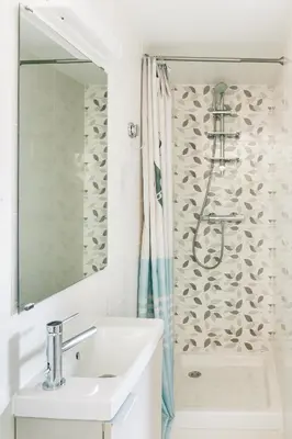 a white bathroom with a sink and a shower at Adorable apartment in Nice downtown in Nice