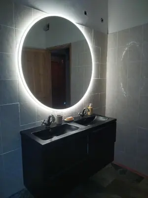 a bathroom with a black sink and a mirror at Chez Brigitte Guesthouse in Nice