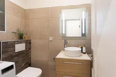 a bathroom with a sink and a toilet at Boutique apartment LA LAVANDE free parking CENTER Nice in Nice