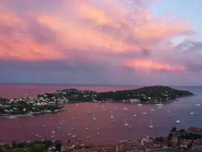 a view of a harbor with boats in the water at Le Rooftop 180 in Villefranche-sur-Mer