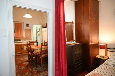 a kitchen and dining room with a table and a dining room at Family Apartment 2BR Old Town near Beach AC in Nice