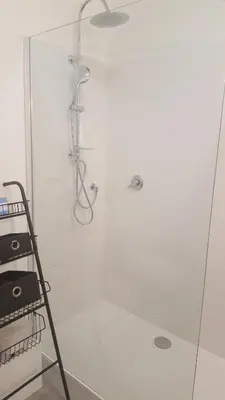a shower with a glass door in a bathroom at Nice France in Nice