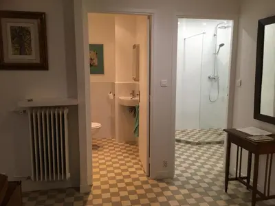 a bathroom with a shower and a sink and a toilet at Les Gérardines by EnjoyNice, 3-room with Airco and balcony in Nice