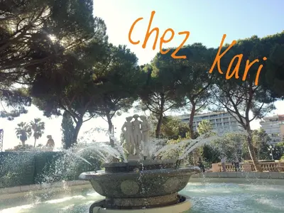 a water fountain in a park with the words chop karl at Chez Kari-top location in charming old town in Nice