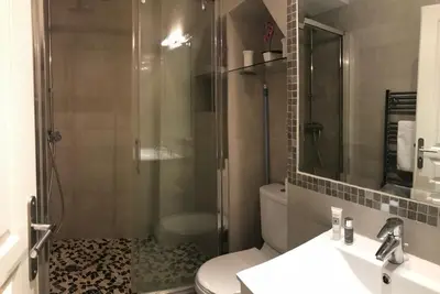 a bathroom with a shower and a toilet and a sink at Je suis à Nice in Nice