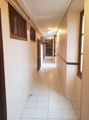 an empty hallway of a building with a hallwayngth at Studette en plein cœur du Vieux Nice in Nice