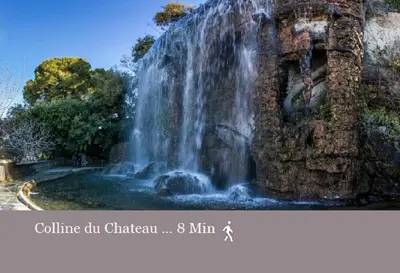 a waterfall on the side of a stone wall at Nice Centre Flat - Modern, Quiet and Brand New in Nice