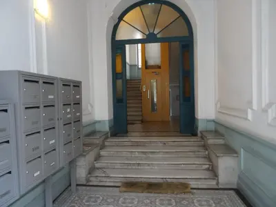 an archway leading to a door in a building at F2 Centre - Gare in Nice