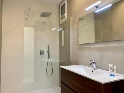 a bathroom with a sink and a shower at Florida Blue - Easy Home Booking in Nice