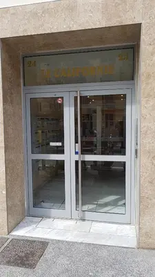 a store with two glass doors in a building at Nissa La Bella in Nice