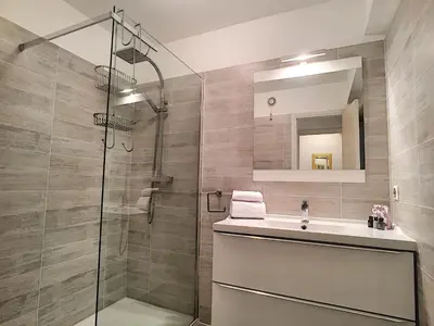a bathroom with a shower and a sink at Nestor&Jeeves - MARIN DEBUSSY - Central - By shopping area in Nice