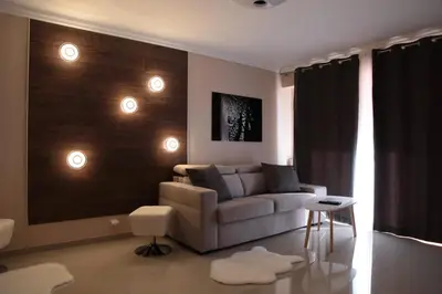 a living room with a couch and a table at Stylish 2 Room Flat 60 meters to the beach in Nice