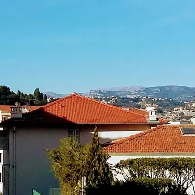 a group of buildings with red roofs at Appartement Nice Port in Nice