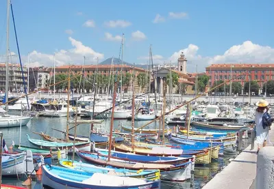 a bunch of boats docked in a harbor with buildings at Appartement Nice Port in Nice