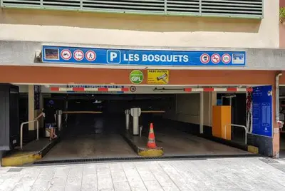 a man is walking through a tunnel in a building at Le Californie Côte d'azur plage les pieds dans L'eau in Nice