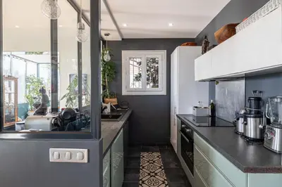 a kitchen with a sink and a counter at Villa Iris in Nice