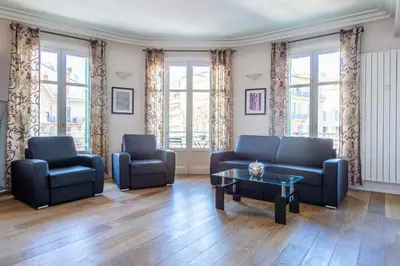 a living room with two couches and a coffee table at VICTOR HUGO - Modern and sunny, terrace, 2 baths in Nice