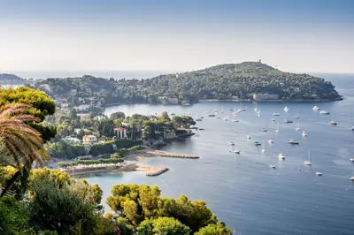 a view of a harbor with boats in the water at RESIDENCE DU CAP AP2027 - Villefranche-sur-Mer, by Riviera Holiday Homes in Villefranche-sur-Mer