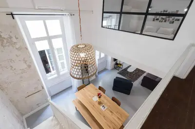 an overhead view of a living room with a table and chairs at Prefecture Duplex - Old Town in Nice